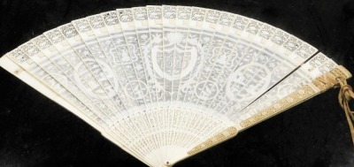 A Canton Chinese ivory pierced fan, with fine detailing, bearing the central shield shaped cartouche with initials AR, with buildings and tree scenes, in display case, 19thC, the case 48.5cm x 34cm the fan 40cm x 25 cm. - 7