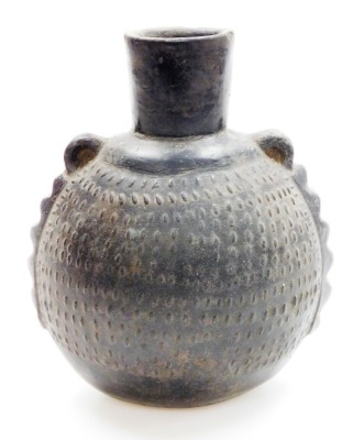 A Chinese pottery ovoid ewer with single handle and relief decorated body, 19thC or earlier, 20cm high. - 11