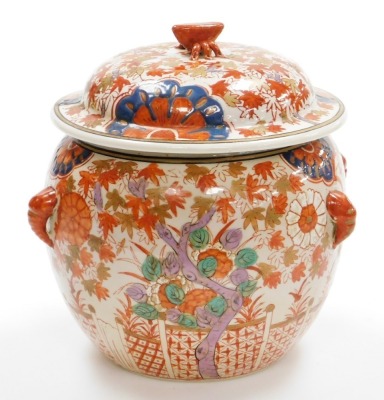 A 20thC Japanese Imari tureen and cover, decorated with trees beside fences, chrysanthemums, four elephant head handles, signed on the base, Meiji/Taisho period, 22cm high. - 3