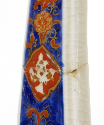 A 19thC Japanese Imari porcelain vase shaped as a well bucket, decorated with panels of trees, scrolls and shishi, signed to base, Meiji period, 30cm high. (AF) - 7