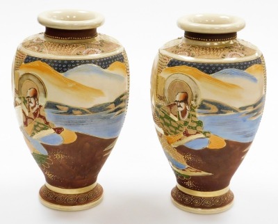 A pair of 20thC Japanese Satsuma baluster vases, decorated with deities in a mountainous landscape, signed to base, 30cm high. - 2