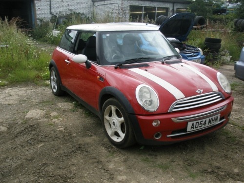 A Mini Cooper, registration AD54 MHM, 105,665 miles. Vehicle has been started and run around the yard. Sold as seen, no V5.