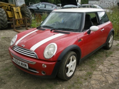 A Mini Cooper, registration AD54 MHM, 105,665 miles. Vehicle has been started and run around the yard. Sold as seen, no V5. - 2