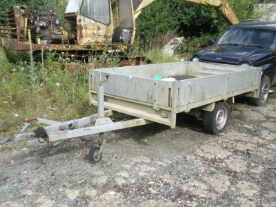 An Ansemms single axle trailer, with four drop sides.