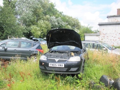 A group of five scrap vehicles. Peugeot 207 SW, registration KW07 PXX, Mondeo LX Estate, registration NV53 MHY, Vauxhall Corsa CDTI, FN05 VWA, Kia Rio LE, registration GU05 JEO, Chevolet Tacuma, registration YT07 NDF. - 2