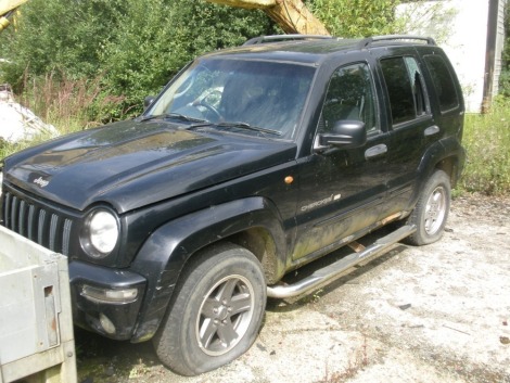 A group of three scrap vehicles, Subaru, registration K350 KNN, Ford Focus, registration AY02 BCF, Jeep Cherokee.