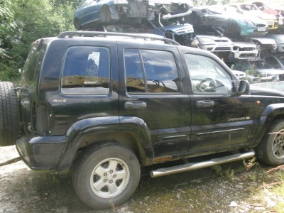 A group of three scrap vehicles, Subaru, registration K350 KNN, Ford Focus, registration AY02 BCF, Jeep Cherokee. - 2