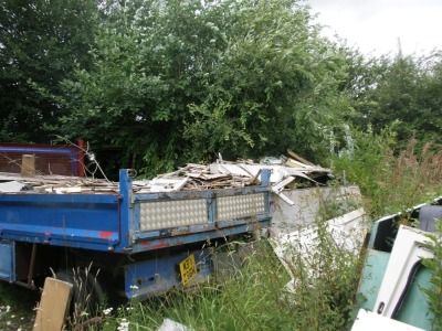 The Residual Scrap Vehicles on site together with other scrap hidden in the undergrowth. To include c95 cars, American motor home, five caravans, dumper truck, transit tipper, various van cabs, ambulance, lorry, trailer chassis's, building profile sheet, - 4