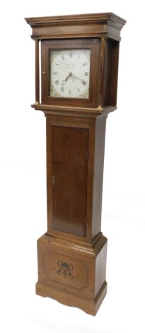 John Marshall, Chumleigh. A 19thC longcase clock, the square dial painted with berries, patera, etc., 28cm wide, with a thirty hour four pillar movement, in an associated oak and mahogany case, inlaid in Art Nouveau style, 196cm high.