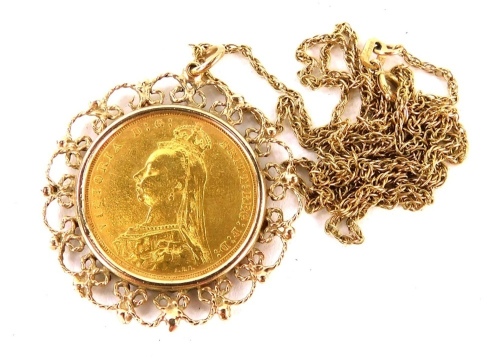 A Victorian full gold sovereign pendant, dated 1892, in a 9ct gold fretwork frame, on fine link chain, 58cm long, 13.4g all in.