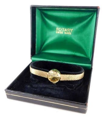 A 9ct gold Rotary ladies wristwatch, with small circular dial, on a bark effect articulated bracelet, the dial 1.5cm wide, approx 16cm long, 19.2g all in, boxed.