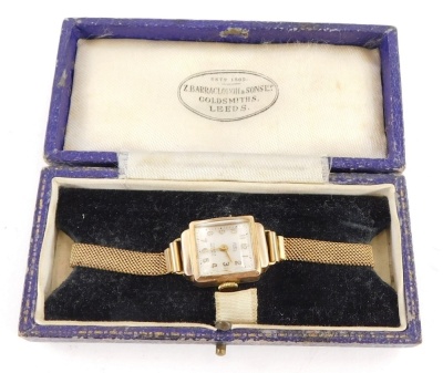 A Trebex wristwatch, with square and silvered colour dial, with convex glass cover, in a yellow metal case, unmarked, on a gold plated strap in a Z Barraclough and Sons Limited of Leeds box.