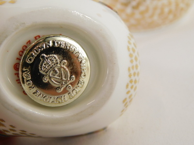 Two Royal Crown Derby porcelain bird paperweights, a Derby wren with gold coloured stopper, and goldcrest with silver coloured stopper, boxed. (2) - 2