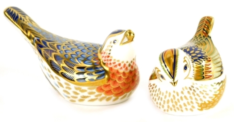 Two Royal Crown Derby porcelain bird paperweights, to include a Collectors Guild Firecrest and a Blue Tit, with gold coloured stoppers, boxed.