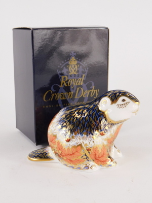 A Royal Crown Derby porcelain paperweight of Riverbank Beaver, limited edition number 3501 of 5000, with gold coloured stopper, 7cm high, boxed. - 3