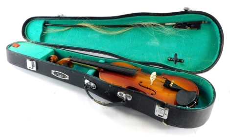 A Lark child's violin, with bow, in a fitted case.