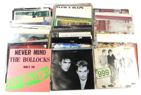 A collection of records, to include Sex Pistols, Never Mind the Bollocks albums, and twelve singles by Queen, A.C.D.C, Spear of Dashing, Bruce Springsteen, etc.