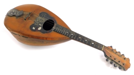 A Neapolitan mandolin, bearing label for Carlo Cristini Naples, 61cm long.