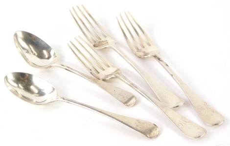 A collection of silver flatware, to include three Victorian silver forks, London 1897, and two table spoons, 10¼oz.