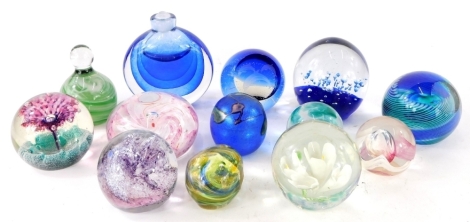 A group of Art Glass paperweights, a Caithness Scotland Eye of The Storm, a Caithness fountain, and various others, unmarked. (a quantity)