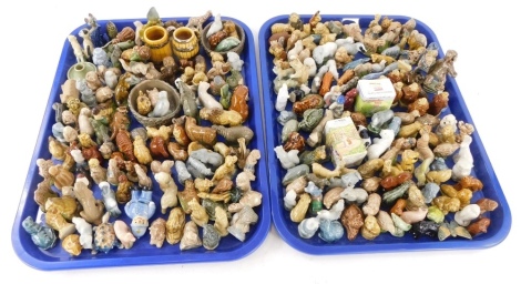 A large quantity of Wade Whimsies, figurines, etc. (2 trays)
