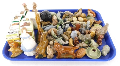 A quantity of Wade Whimsies, figurines, etc., to include some in boxes.