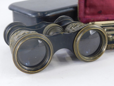 A cased geometry set, an early 20thC box of oblong form and a pair of opera binoculars. (3) - 3