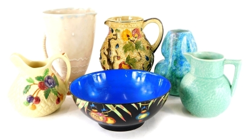 A collection of ceramics, to include Beswick brown glazed jug, Indian Tree Woods jugs, etc.