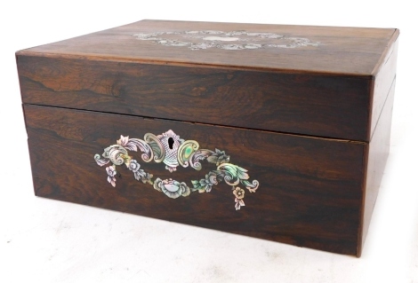 A Victorian rosewood workbox, the hinged lid inlaid with an engraved mother of pearl cartouche enclosing a vacant interior, 30cm wide.