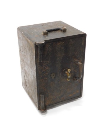 A two handled portable safe, with brass fittings, etc., 50cm wide.