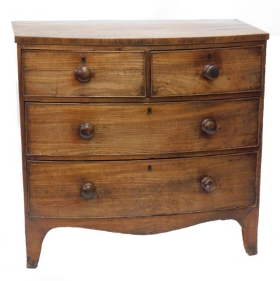 A 19thC mahogany bowfronted chest, of two short and two long drawers, with turned wood handles on bracket feet, 85cm high, 89cm wide.