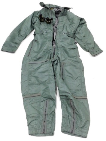 A men's flying coverall, size small/long, type CWU-I-P, made by Skyway Clothing incorporation, and an associated pair of flying type goggles.