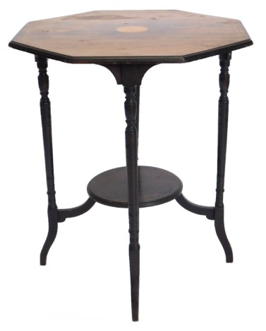 An Edwardian rosewood and ebonised occasional table, the octagonal top inlay centrally with a patera, on turned supports with under tier, 59cm wide.