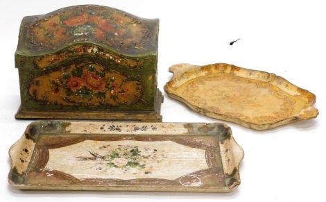 A Venetian gilt and painted casket, decorated overall with flowers, within raised cartouches, the shaped top enclosing a vacant interior on bracket feet, 43cm wide, and two similar trays.