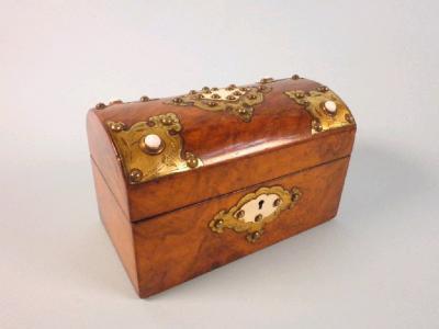 A Victorian walnut and brass tea caddy