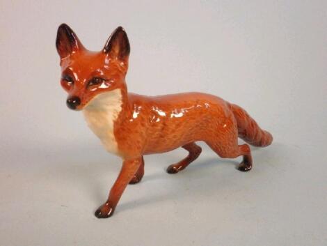 A Beswick fox, 24cm long