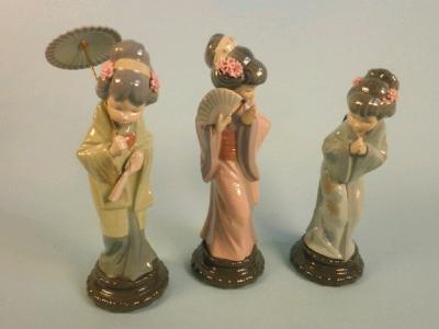 Three Lladro porcelain figures of Japanese ladies