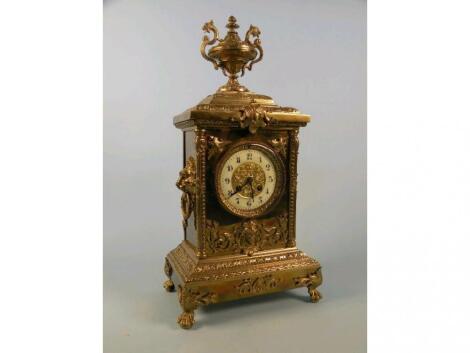 A 19thC Continental brass mantel clock