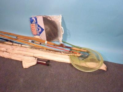 A quantity of vintage fishing rods