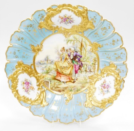 An early 20thC Meissen porcelain cabinet plate, with scroll and cartouche parcel gilt border and painted with a central fete galante scene of a lady and her beau on a colonnade veranda, impressed mark, 30cm diameter.