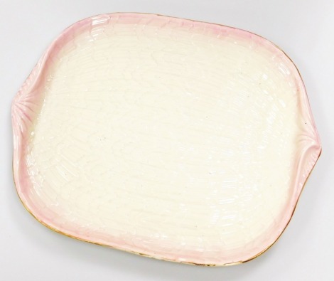 A Belleek black mark third period Tridacna pink tray, 44cm long.