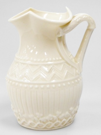 A Belleek first period black mark harp handled jug, c1880, 14cm high.