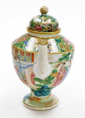 A 19thC Chinese Canton porcelain teapot, of ovoid form, the body with a continuous band of figural decoration, below butterflies and flora on a gilt ground, the domed lid with spherical knop,22cm high. (AF) - 4