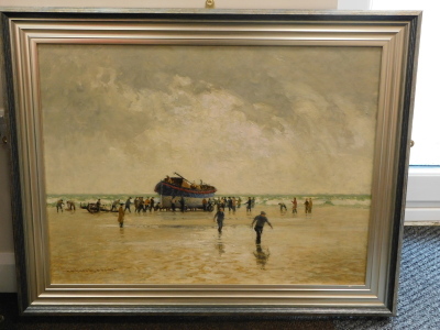 Normal Wilkinson (1878-1971). Coastal scene, figures with fishing boat, oil on canas, signed, 59cm x 79.5cm. - 2