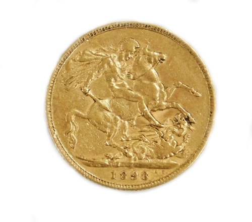 A Victorian full gold sovereign dated 1898.