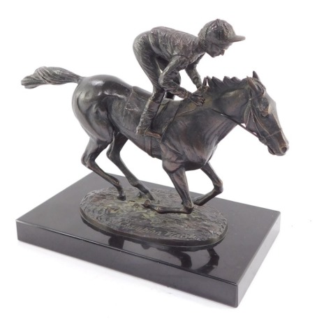 David Cornell (British, 20thC). Champion Finish, bronze study of Lester Piggott riding Nijinsky, signed, dated 1985, on a black polished rectangular base, 19.5cm high.