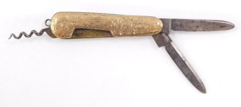 A 9ct gold backed pen knife, with engraved foliate decoration, shield reserve monogram engraved, 52mm wide.