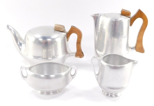 A Picquot ware aluminium four piece tea set, comprising teapot, covered hot water jug, cream jug and sugar bowl.