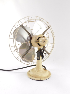 A Limit early 20thC electric fan, raised on a cream painted cast iron stand, Patent No 662079, etc., 36cm high. - 3