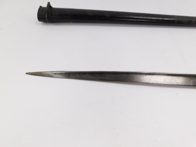 A St Etienne bayonet, with engraved blade dated 1877, with scabbard, 65.5cm wide. - 5